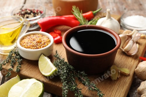 Preview: Soy sauce and other different ingredients for marinade on table, closeup