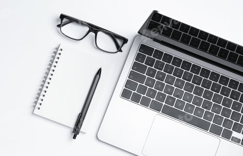 Preview: Laptop, stationery and glasses on white background, flat lay