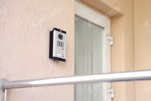 Preview: Modern intercom system on building outdoors, closeup