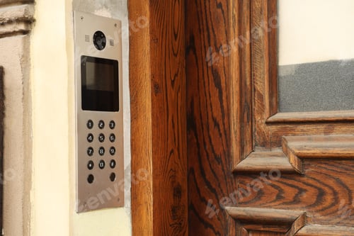 Preview: Modern intercom system on building outdoors, closeup