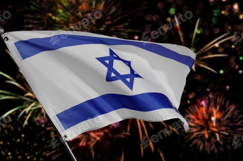 Preview: Flag of Israel against dark sky with bursting fireworks. National holiday