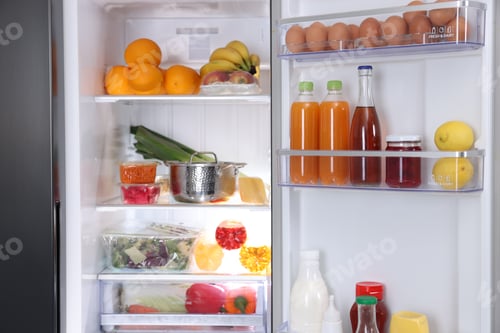 Preview: Modern refrigerator with different fresh food products, closeup