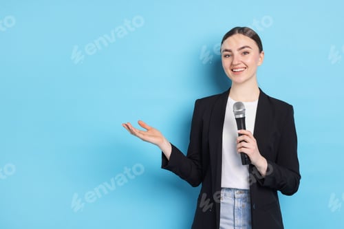 Preview: Happy news presenter with microphone on light blue background, space for text