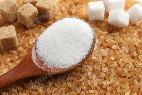 Preview: Different types of sugar and spoon as background, closeup
