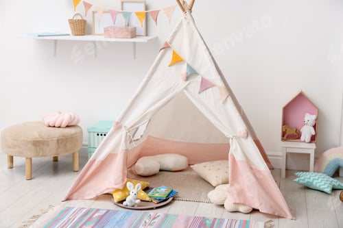 Preview: Cute wigwam with pillows, books and toys in stylish child's room