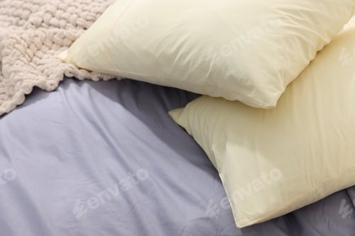 Preview: Comfortable bed with fresh cotton linens, closeup