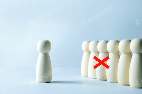 Preview: Dismissal. One human figure with red cross among others on grey table