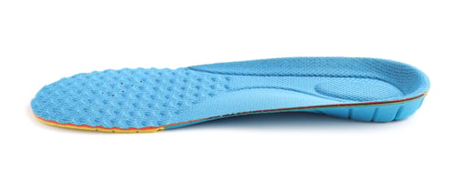 Preview: One blue orthopedic insole isolated on white