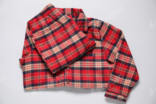 Preview: Checkered pyjamas on white background, top view