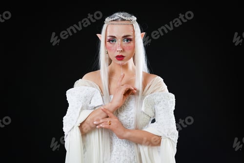 Preview: Portrait of beautiful elf girl on black background