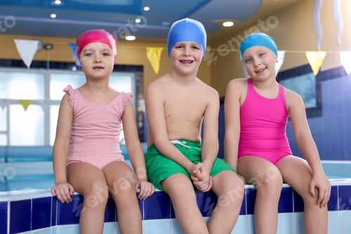 Preview: Cute little kids at indoor swimming pool