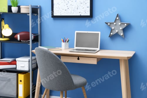 Preview: Stylish workplace with laptop and stationery in child's room
