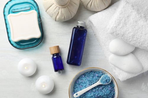 Preview: Flat lay composition with spa products on light wooden table