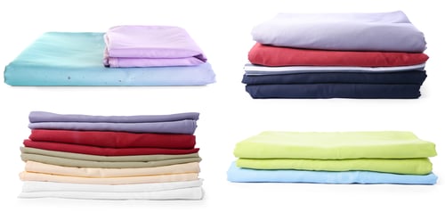 Preview: Stacked bed linens isolated on white, set