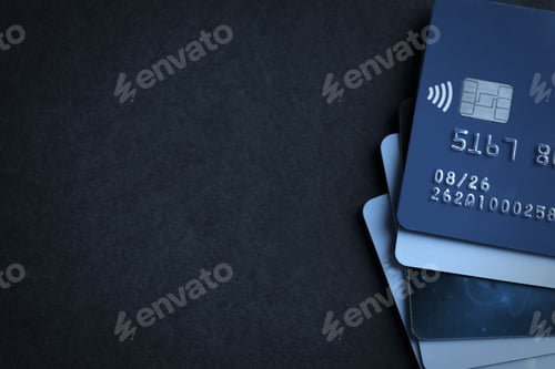 Preview: Many different credit cards on black table, top view