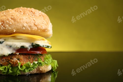 Preview: Delicious vegetarian burger on mirror surface against olive background, closeup. Space for text