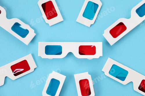 Preview: 3D glasses on light blue background, flat lay