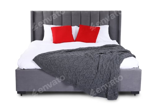 Preview: Large bed with grey blanket and red pillows isolated on white