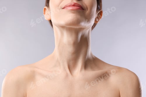 Preview: Woman with healthy skin on light grey background, closeup
