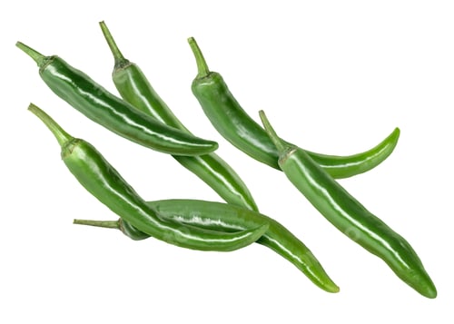 Preview: Green chili peppers flying in air on white background