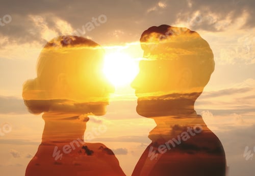 Preview: Silhouettes of man and woman against sunset sky. Love, bonding, relationships