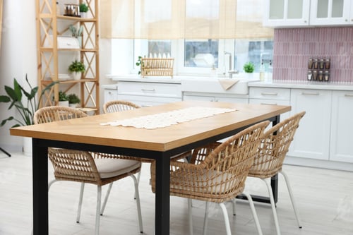 Preview: Dining table with chairs in kitchen, closeup. Stylish interior