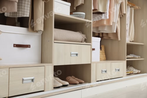 Preview: Large wardrobe with different stylish clothes, closeup