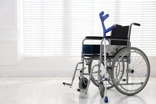 Preview: Empty wheelchair and elbow crutch indoors, space for text. Mobility aid