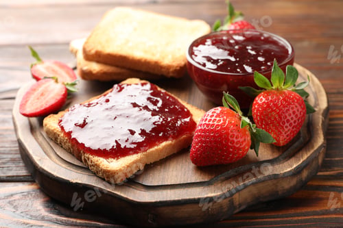 Preview: Toasted bread with strawberry jam and fresh berries on wooden table, closeup