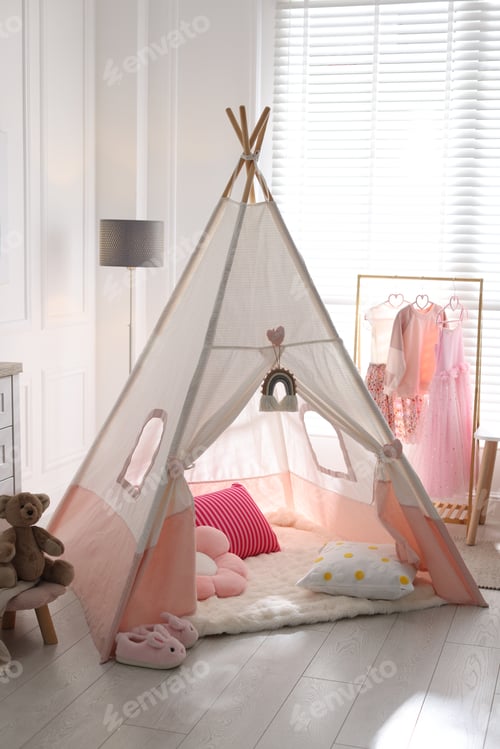 Preview: Cute wigwam, clothes, cushions and toy in stylish child's room