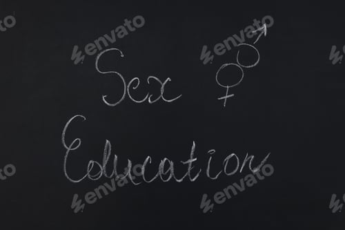 Preview: Words Sex Education and gender symbols drawn on blackboard