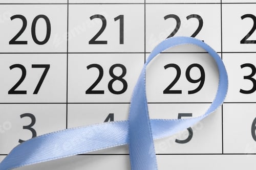Preview: International Psoriasis Day. Light blue ribbon and calendar page with marked date, top view