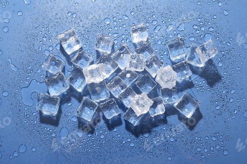 Preview: Melting ice cubes and water drops on blue background, flat lay