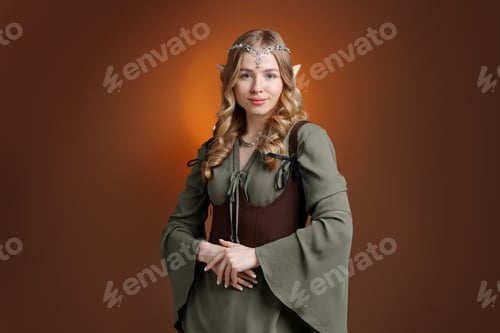 Preview: Beautiful girl dressed as elf on brown gradient background
