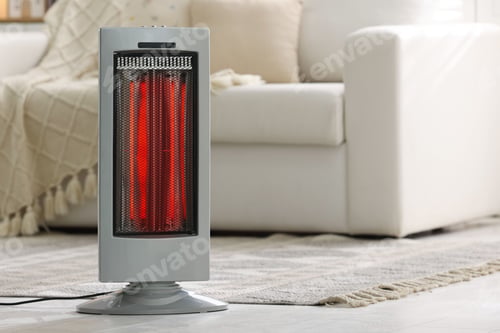 Preview: Electric heater in living room, space for text. Domestic appliance
