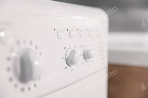 Preview: Modern washing machine indoors, closeup of control panel