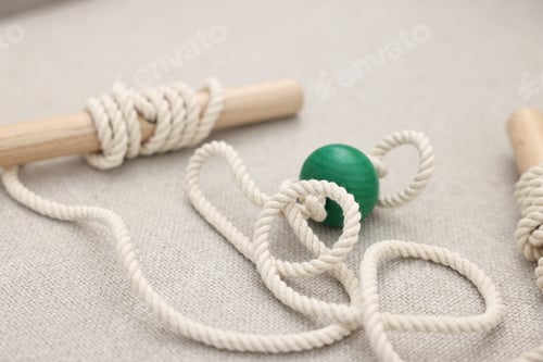 Preview: Toy for children's motor skills on sofa, closeup
