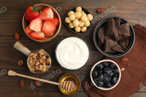 Preview: Fresh ingredients for yogurt bark on wooden table, flat lay