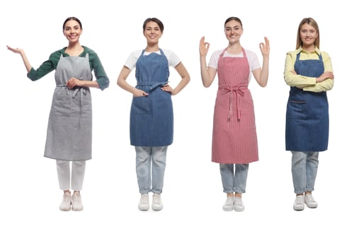 Preview: Women wearing different aprons on white background. Collection of portraits