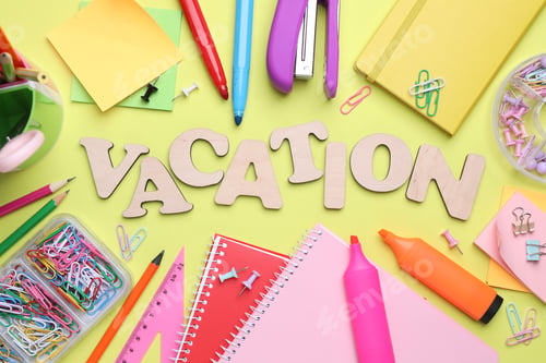 Preview: Word Vacation made of wooden letters and school supplies on light green background, flat lay