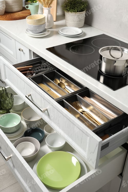 Preview: Ceramic dishware and cutlery in drawers in kitchen