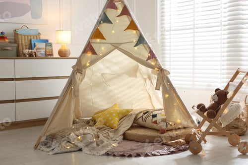 Preview: Cute wigwam with fairy lights and toys in stylish child's room