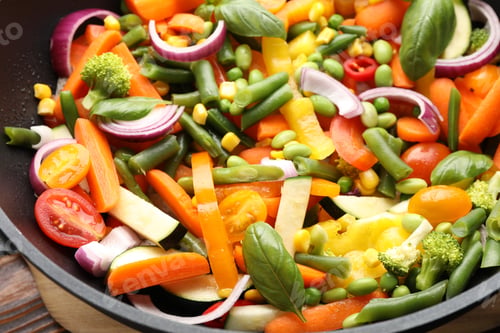 Preview: Different vegetables in wok on wooden table, closeup