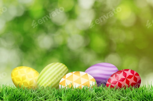 Preview: Easter eggs in green grass against blurred background
