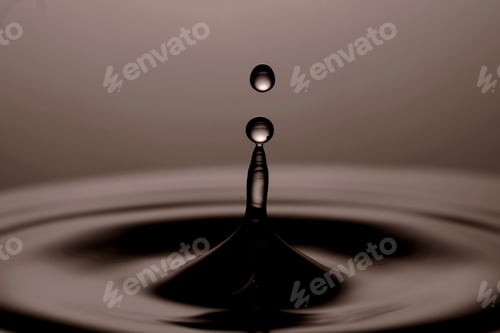 Preview: Soy sauce drop falling into liquid, closeup
