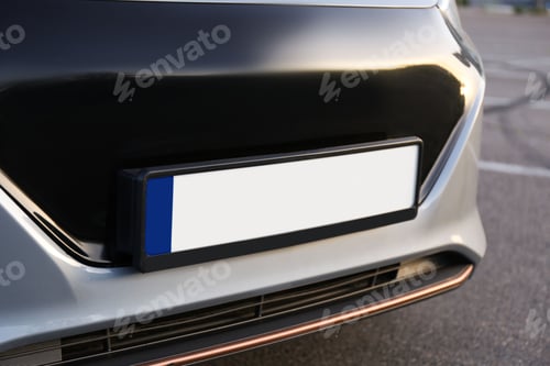 Preview: Vehicle registration plate on car outdoors, closeup