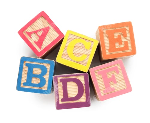 Preview: Wooden cubes with letters on white background, top view