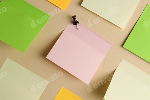 Preview: Blank colorful notes pinned on beige wall, closeup