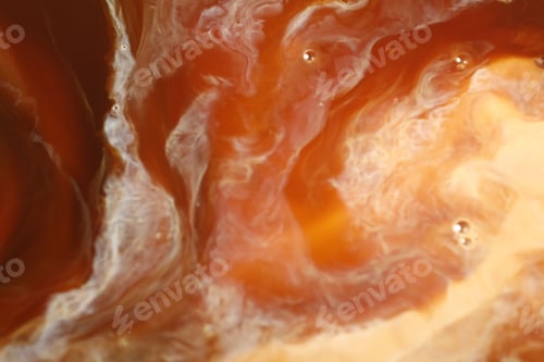 Preview: Delicious coffee with milk and bubbles as background, top view