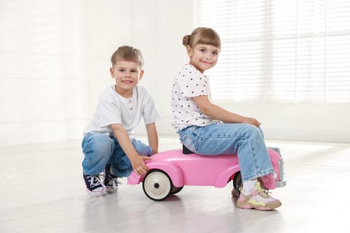 Preview: Little children with toy car at home